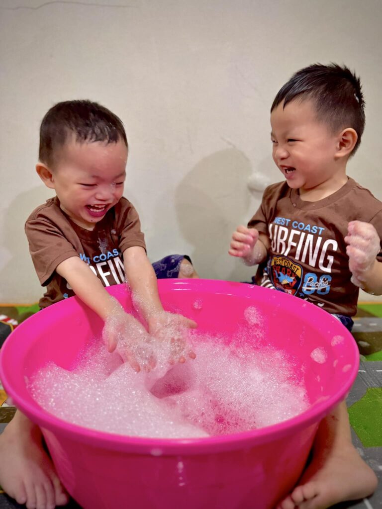 kids are having fun playing soap